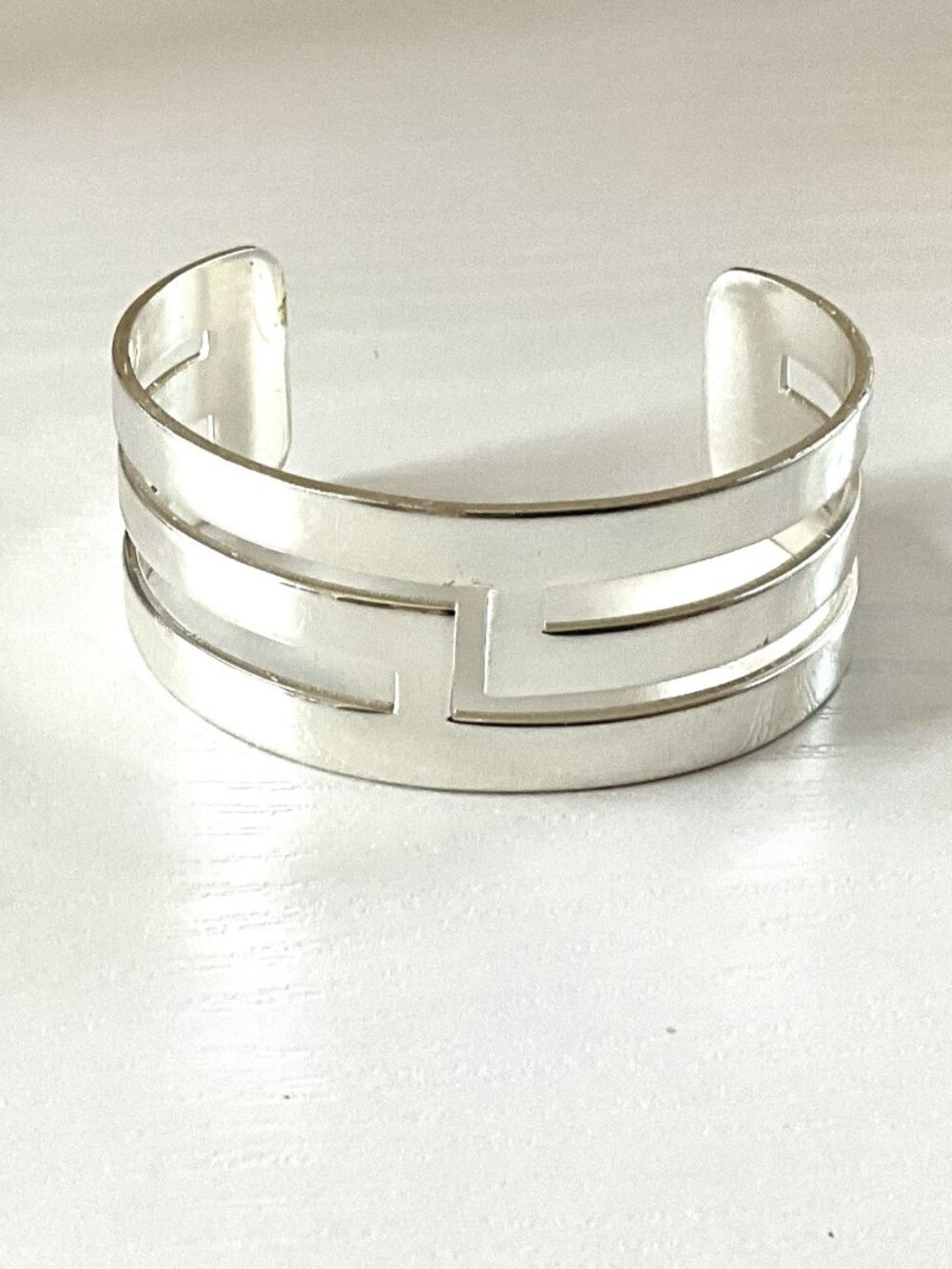 Rustic Cuff Silvertone Geometric Adjustable Logo Bracelet - Picture 1 of 2